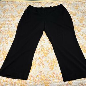 Black dress pants. Size 22WS. Made of polyester, rayon, and spandex.